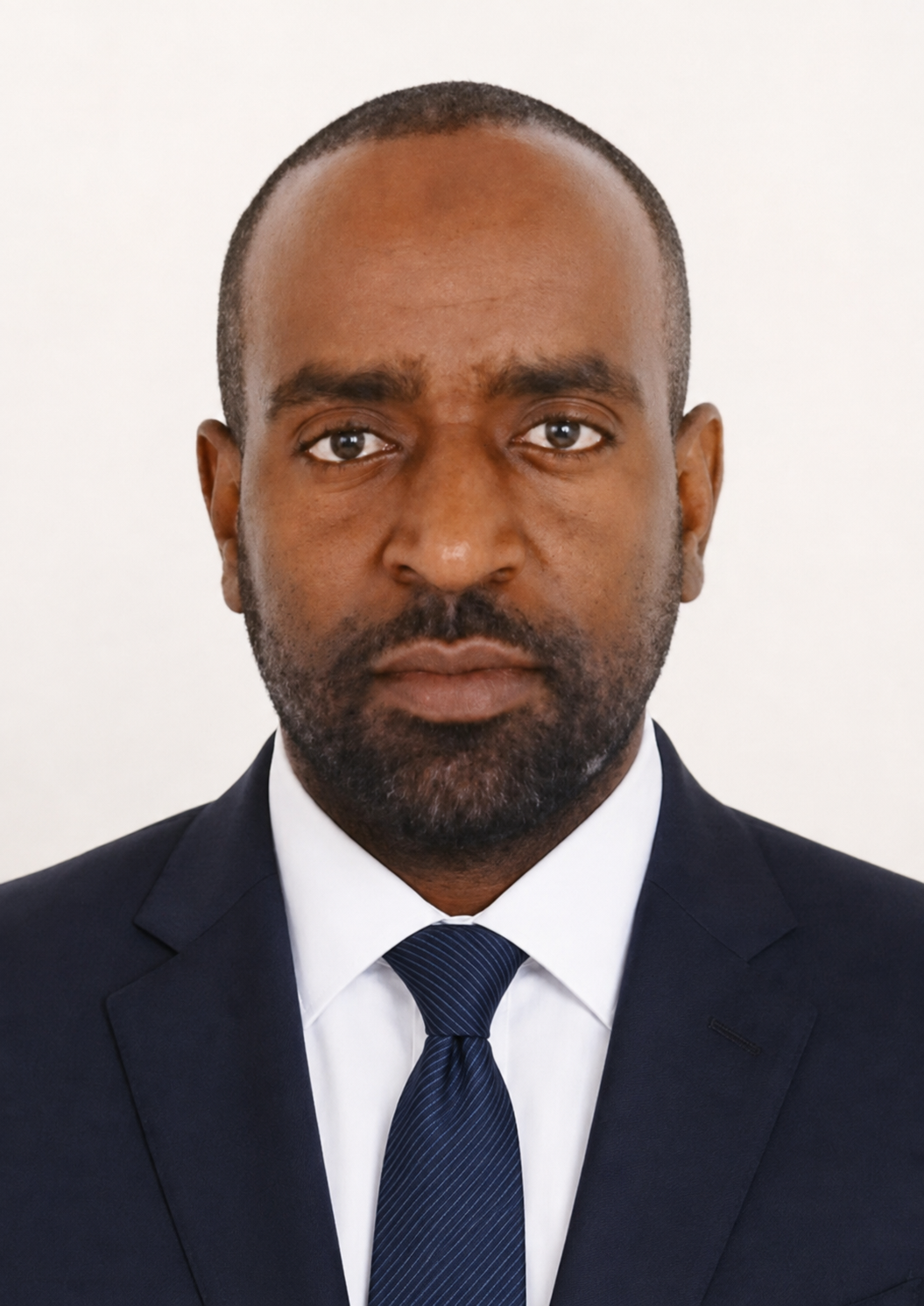 Formal portrait of Abdulmuen Mohamed, Founder and CEO of Caffa Coffee Importers Ltd.